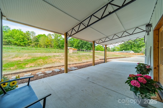 view of patio / terrace featuring fence