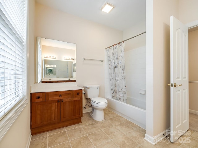 full bath with vanity, shower / tub combo with curtain, toilet, tile patterned floors, and baseboards