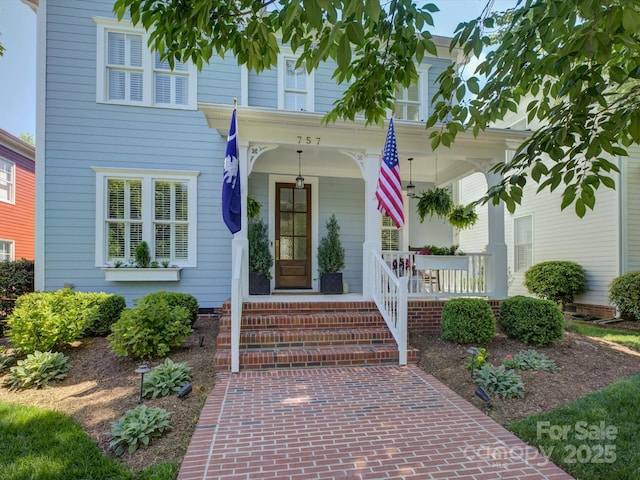 doorway to property with a porch