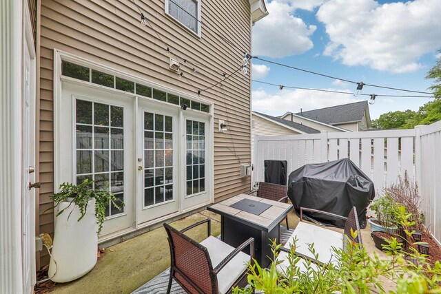 8259 Carob Tree Ln, Charlotte, NC 28215 - view of patio with fence, area for grilling, and french doors