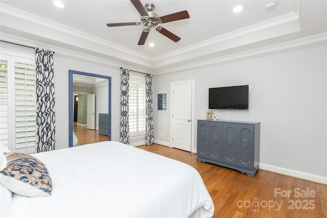 1517 Waverly Ave, Charlotte, NC 28203 - bedroom with crown molding, wood finished floors, baseboards, recessed lighting, and a tray ceiling