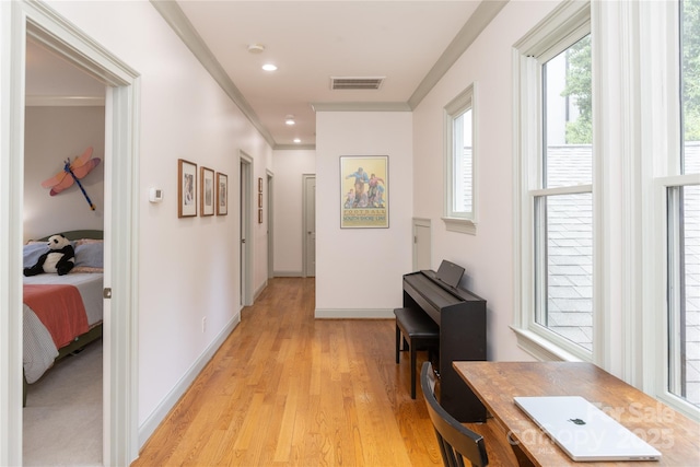1517 Waverly Ave, Charlotte, NC 28203 - corridor featuring light wood-style floors, ornamental molding, and baseboards