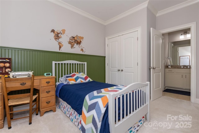 1517 Waverly Ave, Charlotte, NC 28203 - bedroom featuring carpet, a closet, a wainscoted wall, and ornamental molding