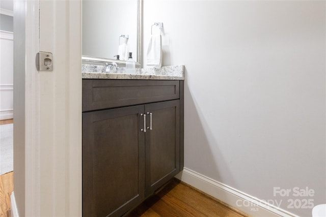1517 Waverly Ave, Charlotte, NC 28203 - bathroom with vanity and wood finished floors