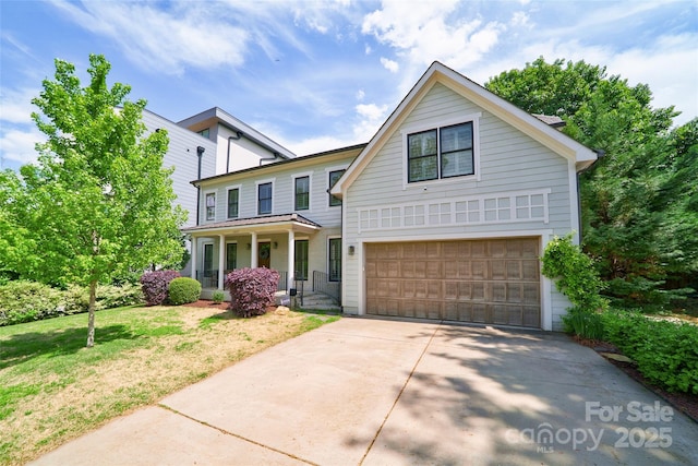 1517 Waverly Ave, Charlotte, NC 28203 - traditional-style house featuring a porch, a garage, driveway, and a front yard