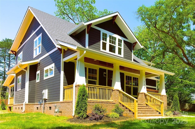116 S Broad St, Waxhaw, NC 28173 - craftsman inspired home with roof with shingles, board and batten siding, and a porch