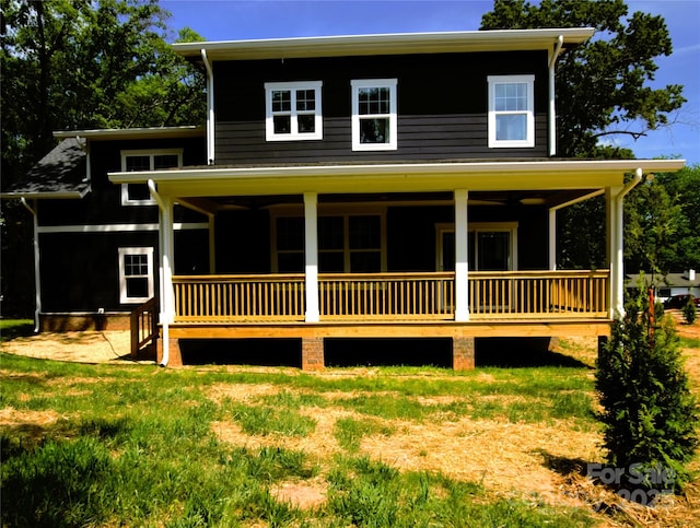 116 S Broad St, Waxhaw, NC 28173 - view of front facade with covered porch and a front yard
