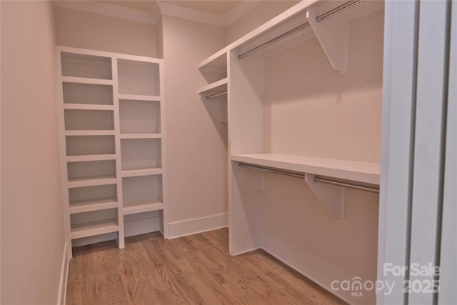 116 S Broad St, Waxhaw, NC 28173 - spacious closet featuring light wood finished floors
