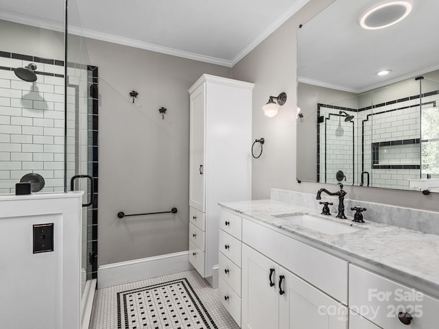 full bathroom featuring vanity, ornamental molding, tile patterned flooring, baseboards, and a stall shower