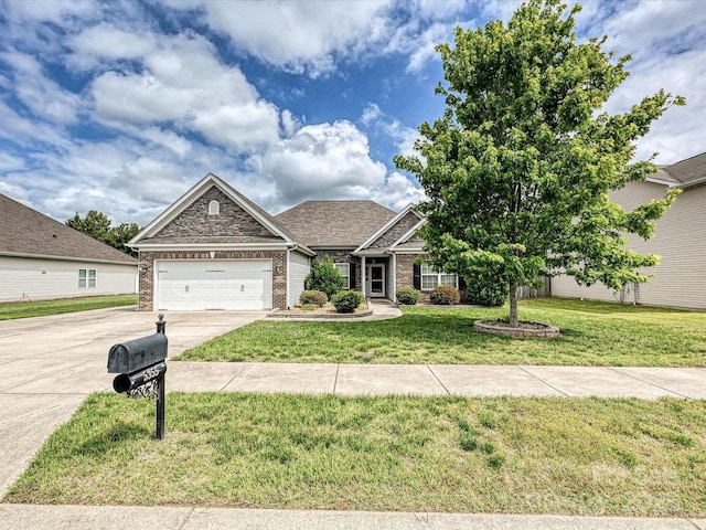 5355 Hackberry Ln SW, Concord, NC 28027 - craftsman-style home with a front lawn, brick siding, a shingled roof, concrete driveway, and an attached garage