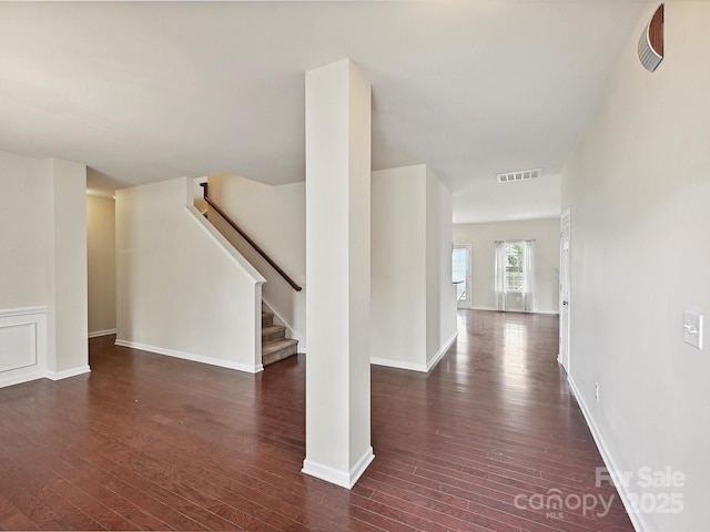 5355 Hackberry Ln SW, Concord, NC 28027 - foyer entrance featuring stairs, baseboards, visible vents, and dark wood-style floors