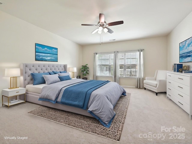 5355 Hackberry Ln SW, Concord, NC 28027 - bedroom featuring visible vents, ceiling fan, and light carpet