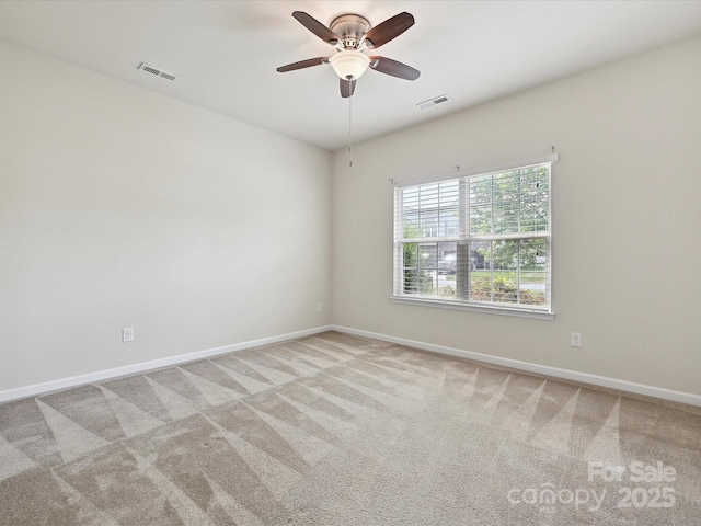 5355 Hackberry Ln SW, Concord, NC 28027 - carpeted empty room featuring a ceiling fan, baseboards, and visible vents
