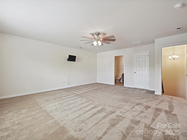 5355 Hackberry Ln SW, Concord, NC 28027 - empty room with visible vents, carpet, ceiling fan with notable chandelier, and baseboards