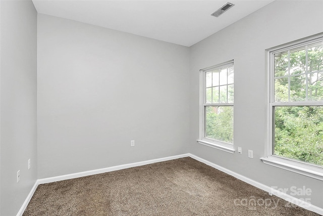 526 N Davidson St, Charlotte, NC 28202 - spare room with dark colored carpet and healthy amount of natural light