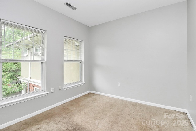 526 N Davidson St, Charlotte, NC 28202 - carpeted empty room with baseboards