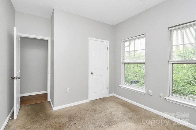 526 N Davidson St, Charlotte, NC 28202 - unfurnished bedroom featuring carpet flooring and baseboards
