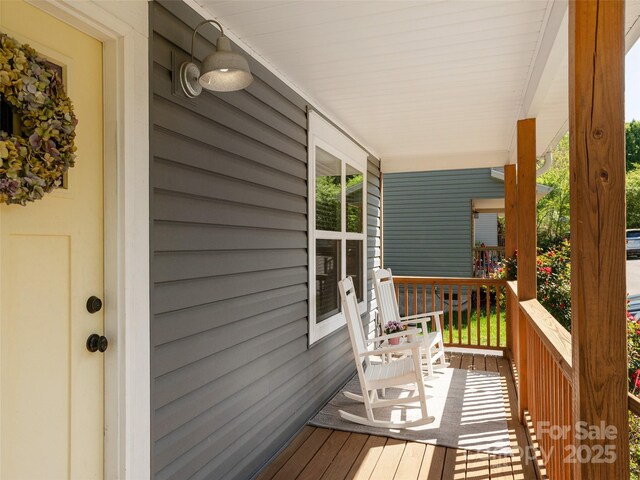 734 Enka Lake Rd, Candler, NC 28715 - deck featuring a porch