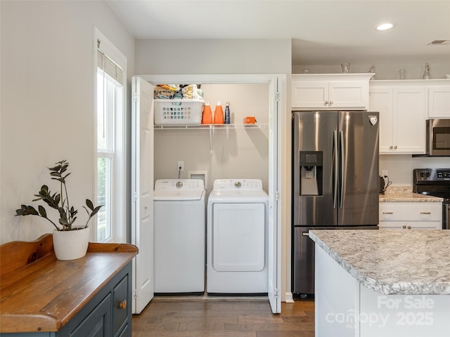 734 Enka Lake Rd, Candler, NC 28715 - clothes washing area with laundry area, visible vents, washing machine and clothes dryer, dark wood finished floors, and recessed lighting