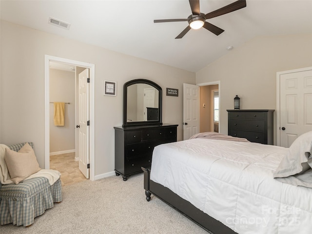 734 Enka Lake Rd, Candler, NC 28715 - bedroom featuring visible vents, baseboards, lofted ceiling, light carpet, and ensuite bath