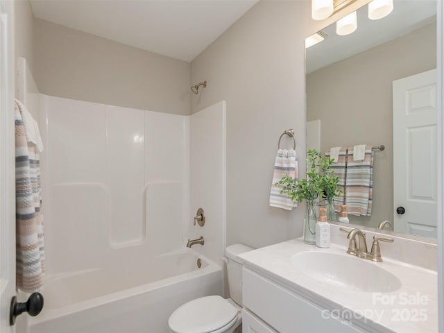 734 Enka Lake Rd, Candler, NC 28715 - bathroom with toilet, shower / washtub combination, and vanity
