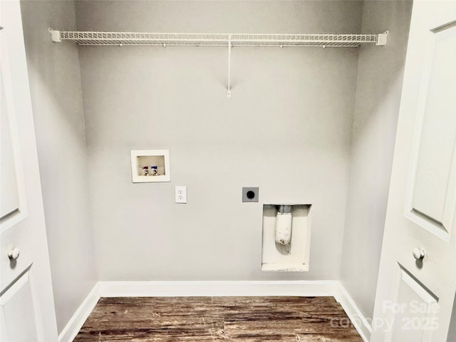 laundry room featuring electric dryer hookup, hookup for a washing machine, wood finished floors, and baseboards