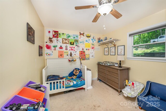carpeted bedroom featuring a ceiling fan