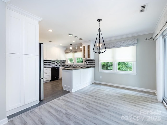 2502 Breuster Dr, Charlotte, NC 28210 - kitchen with visible vents, white cabinetry, dishwasher, and dark countertops