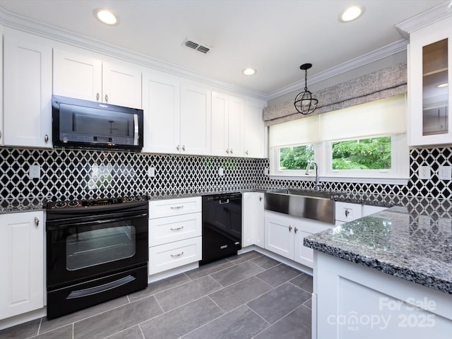 2502 Breuster Dr, Charlotte, NC 28210 - kitchen with visible vents, a sink, white cabinetry, and black appliances