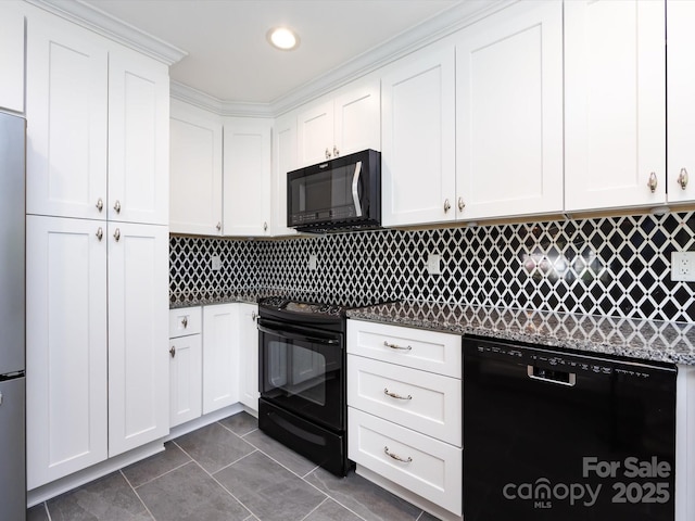 2502 Breuster Dr, Charlotte, NC 28210 - kitchen featuring dark countertops, white cabinetry, backsplash, dark tile patterned floors, and black appliances