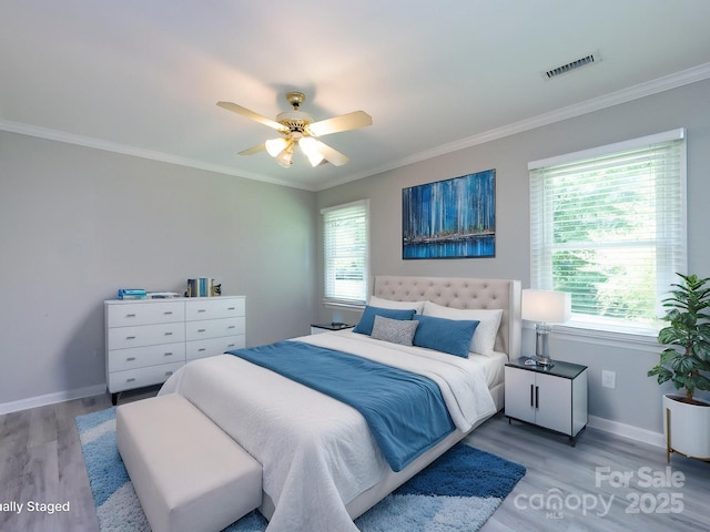 2502 Breuster Dr, Charlotte, NC 28210 - bedroom featuring crown molding, visible vents, and light wood finished floors