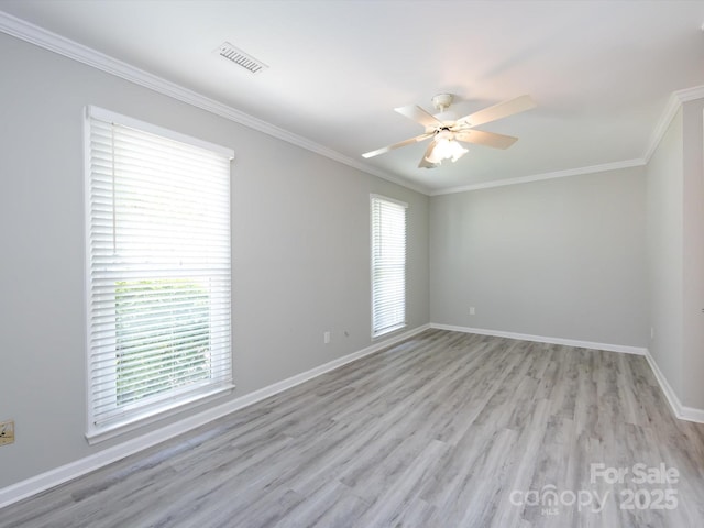 2502 Breuster Dr, Charlotte, NC 28210 - unfurnished room with crown molding, a ceiling fan, light wood-style flooring, and baseboards