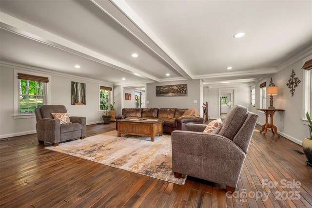 living area featuring recessed lighting, a wealth of natural light, and hardwood / wood-style floors