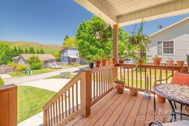 10 Half Moon Dr, Swannanoa, NC 28778 - deck with a lawn, covered porch, and a residential view