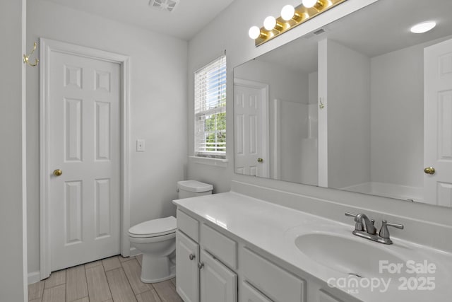 150 Pleasant Grove Ln, Mooresville, NC 28115 - full bath featuring toilet, visible vents, a shower, and vanity