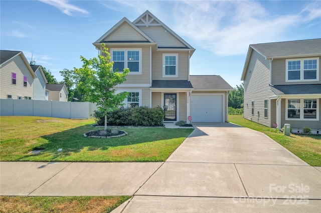 craftsman house featuring concrete driveway, an attached garage, fence, and a front yard