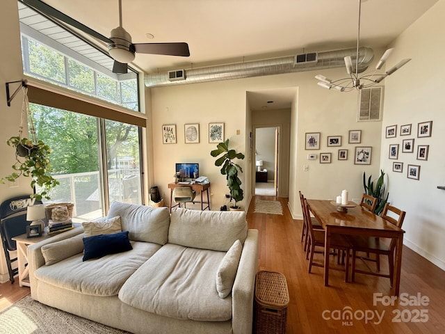 2116 Mcclintock Rd Unit 123, Charlotte, NC 28205 - living area with visible vents and wood finished floors