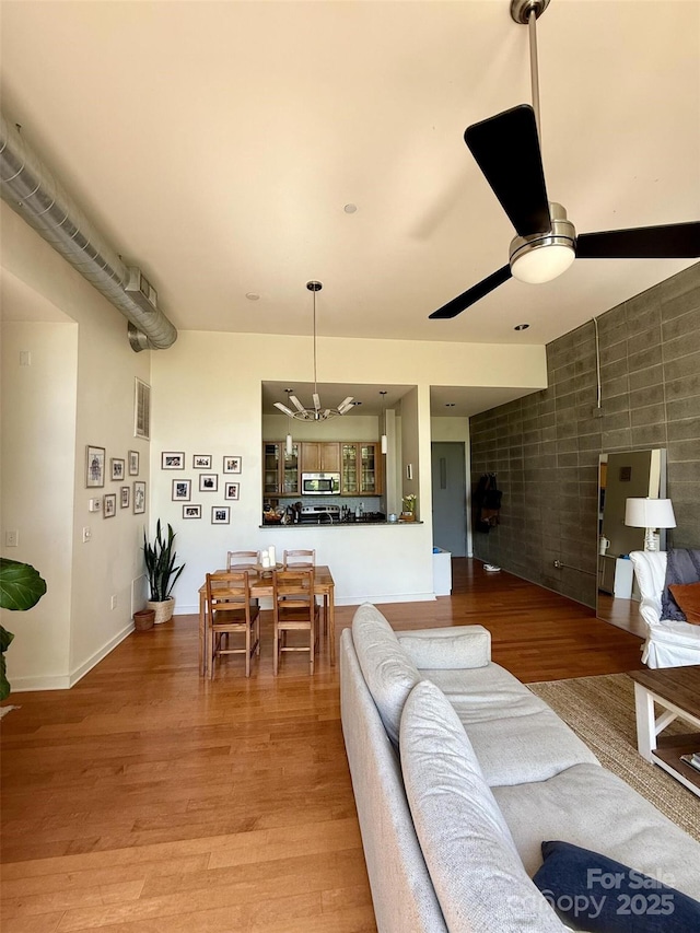 2116 Mcclintock Rd Unit 123, Charlotte, NC 28205 - living room with ceiling fan, visible vents, and light wood-style flooring