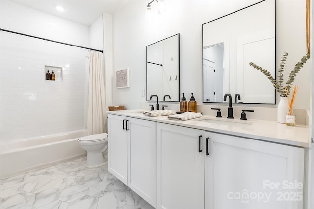 bathroom featuring double vanity, shower / tub combo, a sink, toilet, and marble finish floor