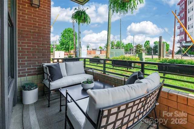 balcony featuring an outdoor living space