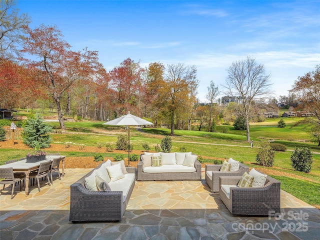 view of patio featuring outdoor lounge area and outdoor dining space