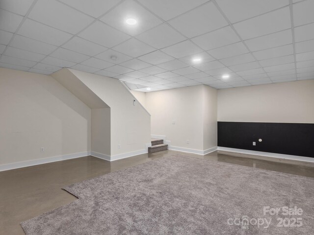 bonus room featuring baseboards, recessed lighting, and stairs
