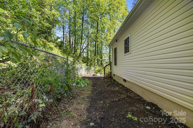 215 Calm Creek Rd, Fletcher, NC 28732 - view of side of home with fence and crawl space