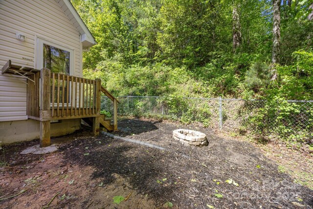 215 Calm Creek Rd, Fletcher, NC 28732 - fenced backyard featuring a forest view and a deck