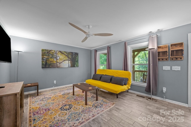 215 Calm Creek Rd, Fletcher, NC 28732 - sitting room featuring ornamental molding, a ceiling fan, wood finished floors, and baseboards