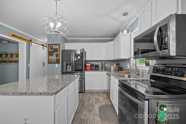 215 Calm Creek Rd, Fletcher, NC 28732 - kitchen featuring stainless steel appliances, a sink, crown molding, white cabinetry, and light stone countertops