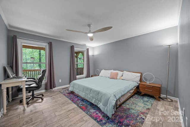 215 Calm Creek Rd, Fletcher, NC 28732 - bedroom with crown molding, wood finished floors, an office area, baseboards, and ceiling fan