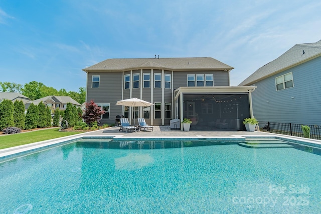 1107 Castle Rd, Indian Land, SC 29707 - swimming pool featuring a sunroom, a patio area, and fence