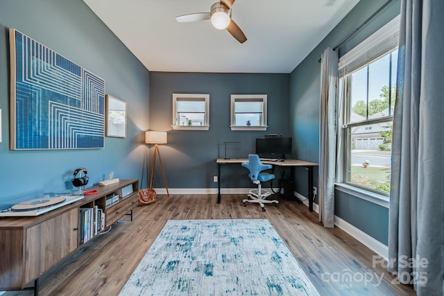 1107 Castle Rd, Indian Land, SC 29707 - office area featuring ceiling fan, wood finished floors, healthy amount of natural light, and baseboards