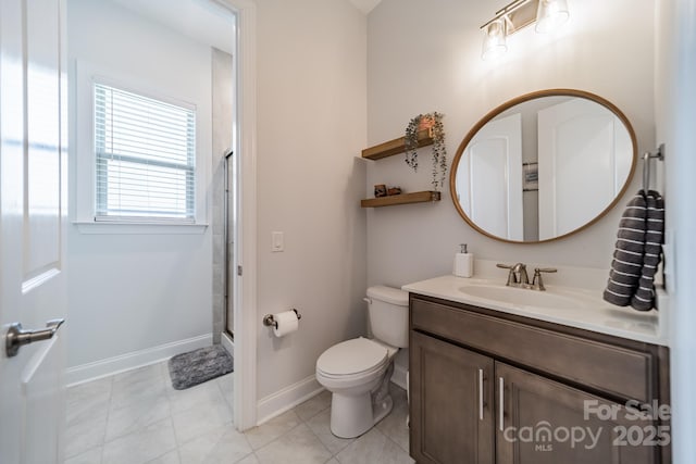 1107 Castle Rd, Indian Land, SC 29707 - bathroom with baseboards, toilet, vanity, a shower, and tile patterned flooring